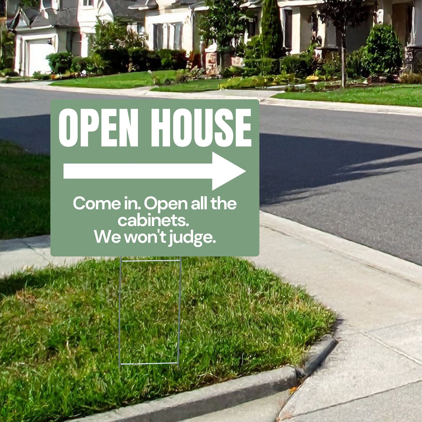 Open house sign on a grassy lawn with a residential street in the background