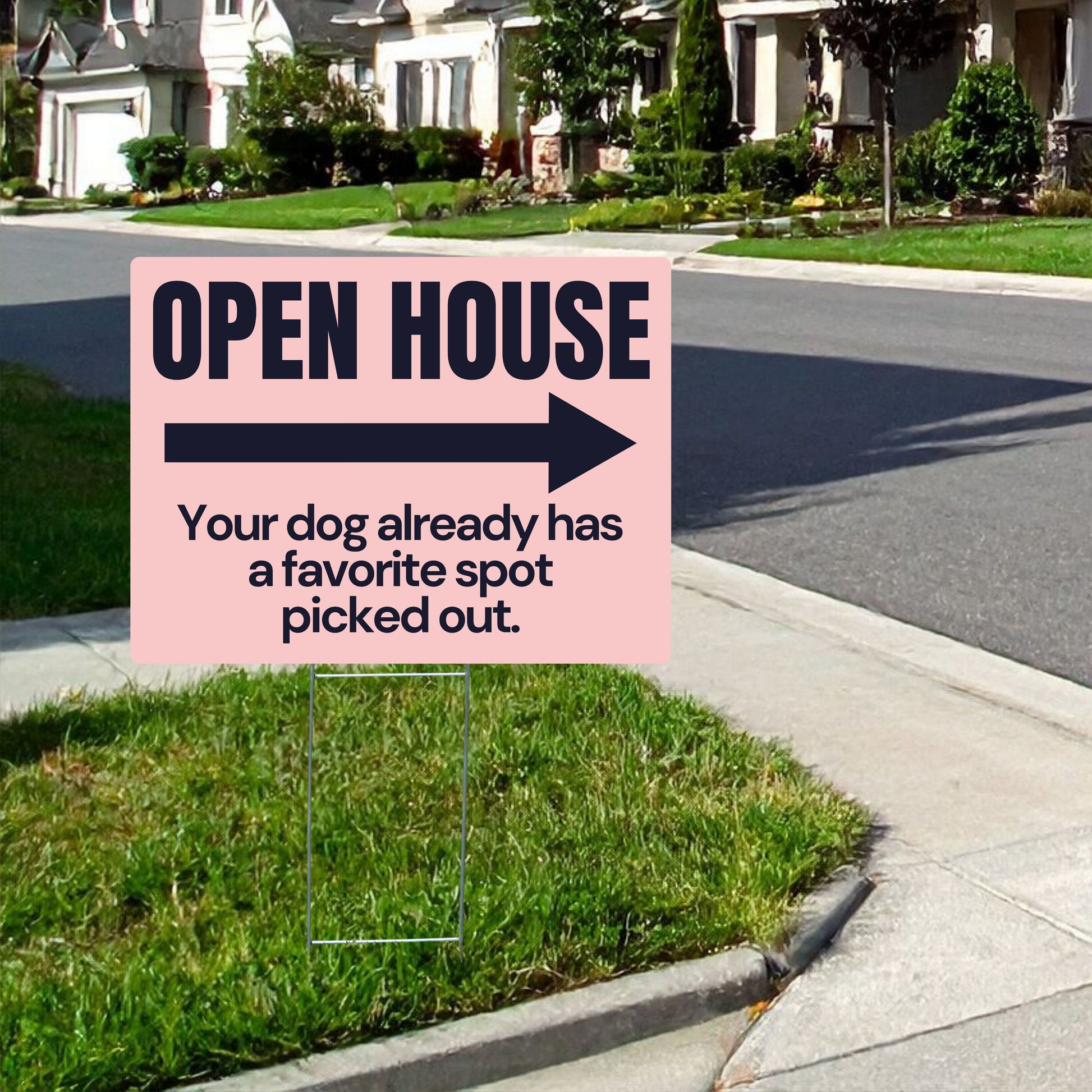 Pink open house sign with humorous text on a grassy lawn.