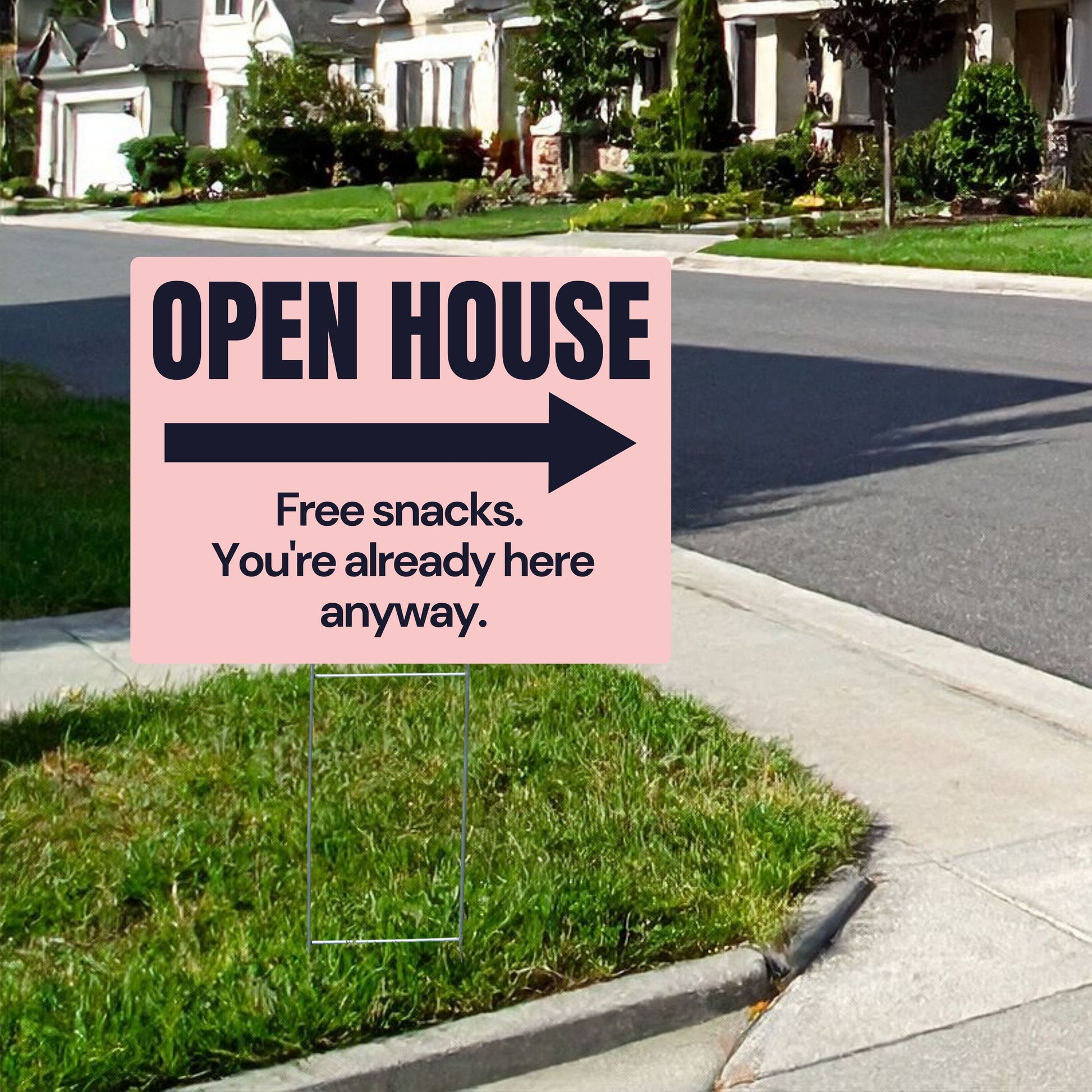 Open house sign with humorous text on a grassy lawn.