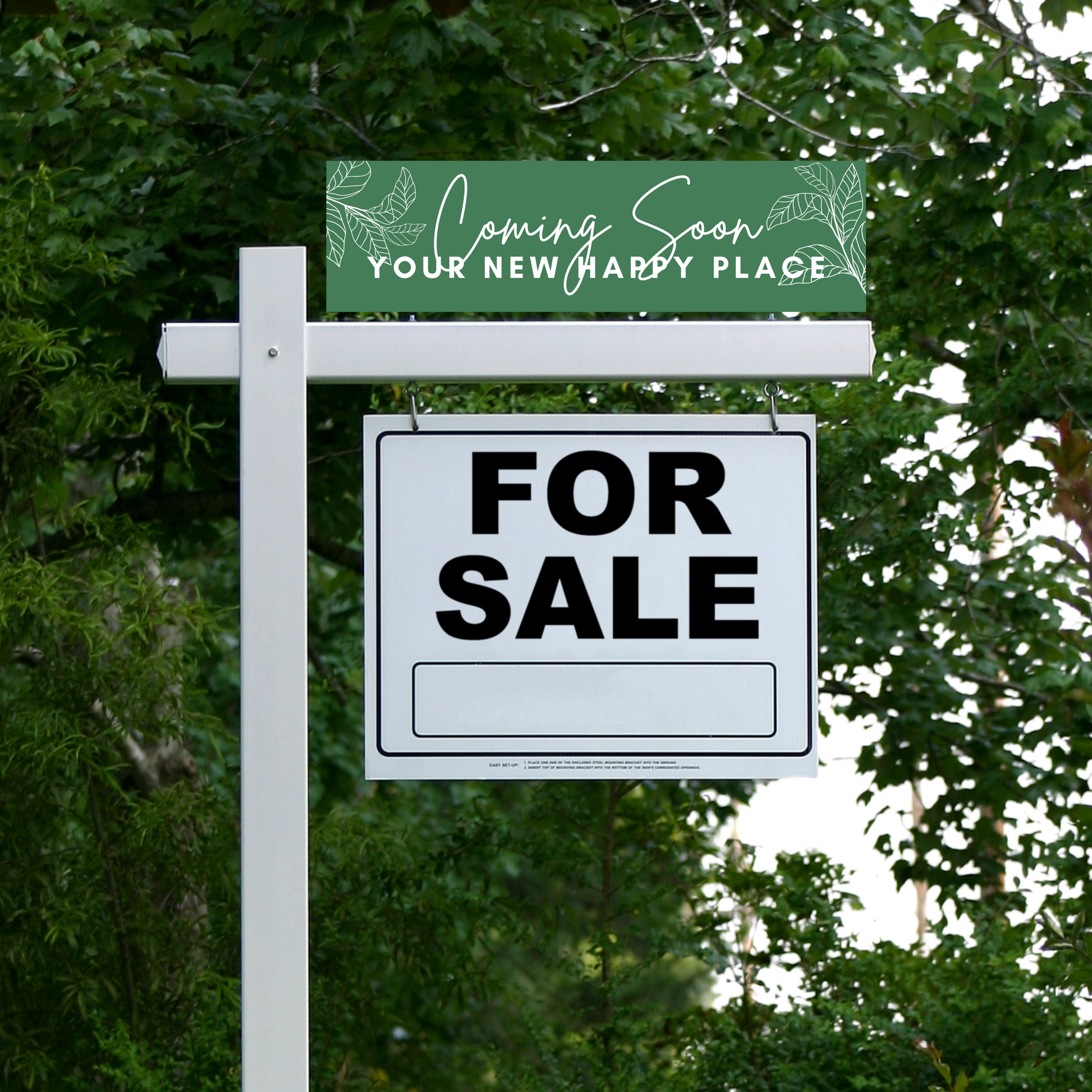 A green and white 'coming soon' sign attached to a 'for sale' real estate sign, both set against a backdrop of trees