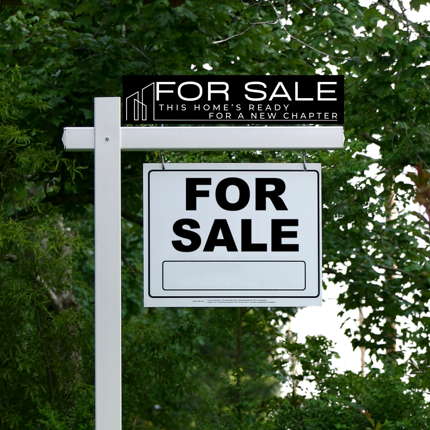 A 'FOR SALE' real estate sign with a 'COMING SOON' sign mounted on top against a backdrop of trees.